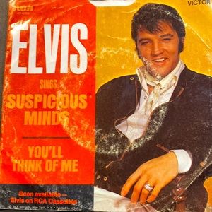 Elvis Presley 45 record. Suspicious Minds
